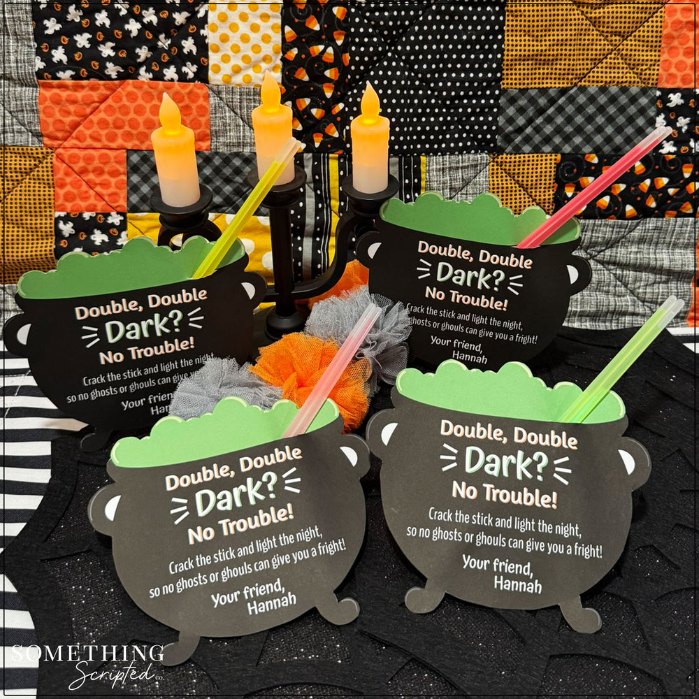 
                  
                    Paper cauldron glow stick holders
                  
                