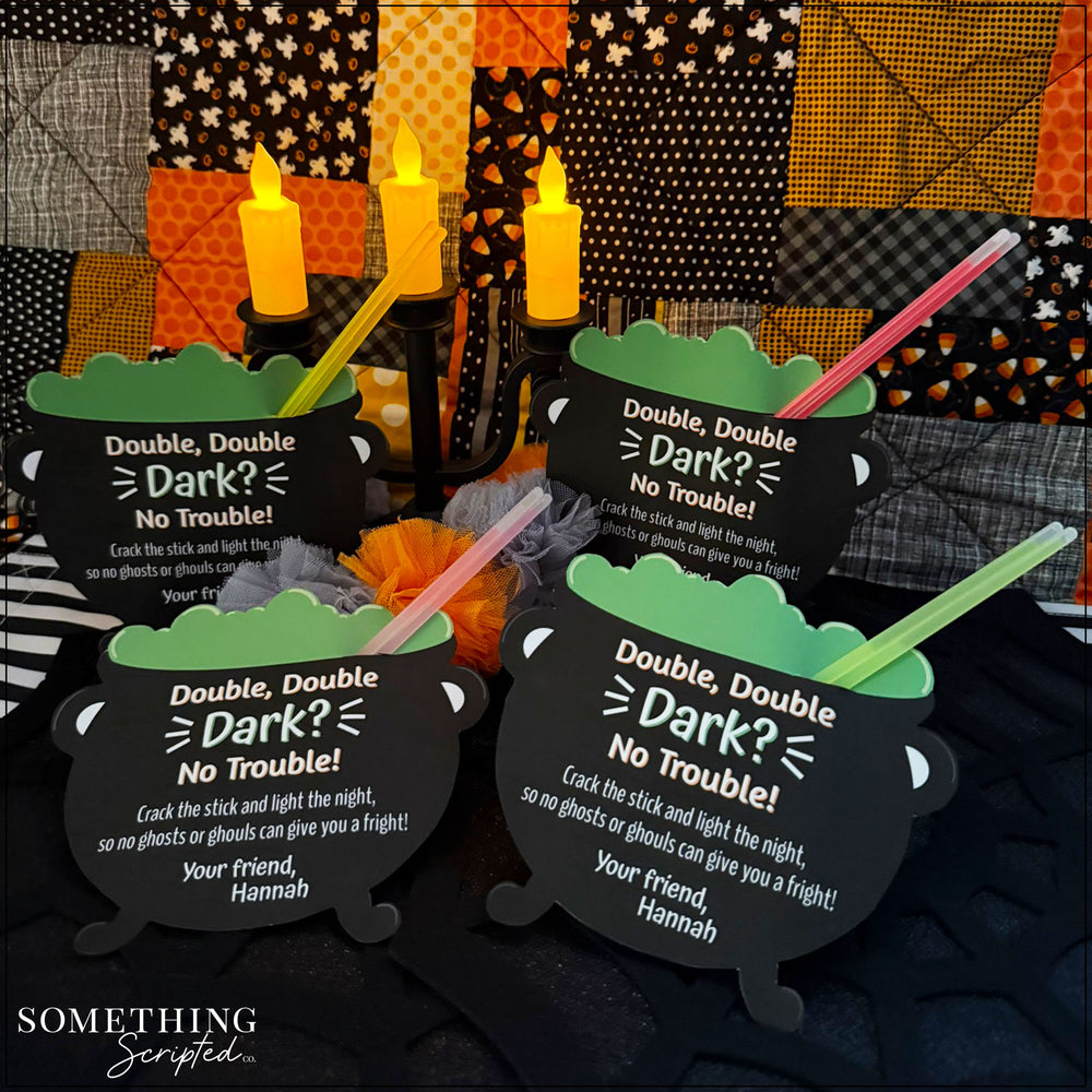 
                  
                    Cauldron printable party favors with text and glow sticks poking out of them on a festive background.
                  
                